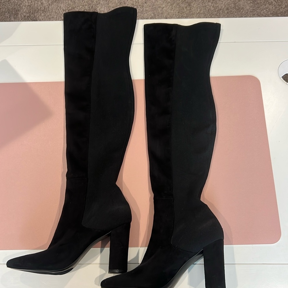 Thigh high black boots